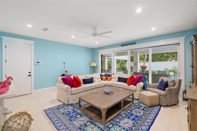 living room with ceiling fan