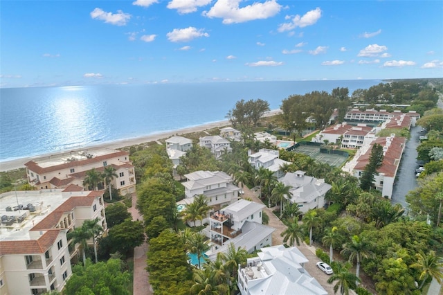 drone / aerial view with a view of the beach and a water view