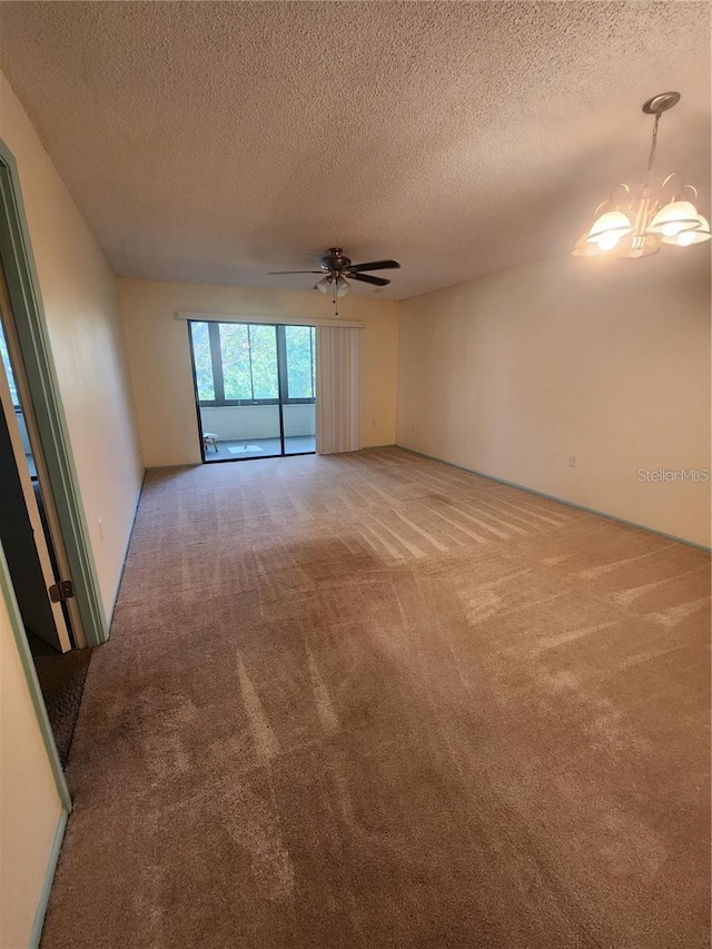 unfurnished room featuring light carpet, a textured ceiling, and ceiling fan with notable chandelier