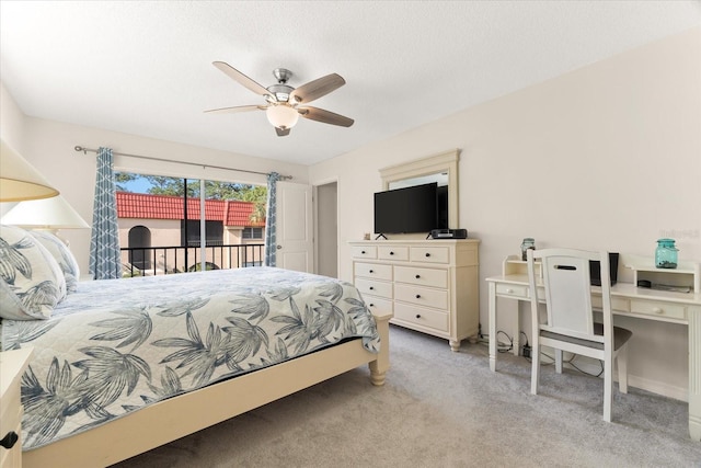 bedroom with light colored carpet, access to outside, and ceiling fan