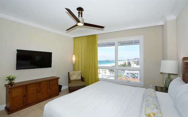 tiled bedroom with a water view, ceiling fan, and crown molding