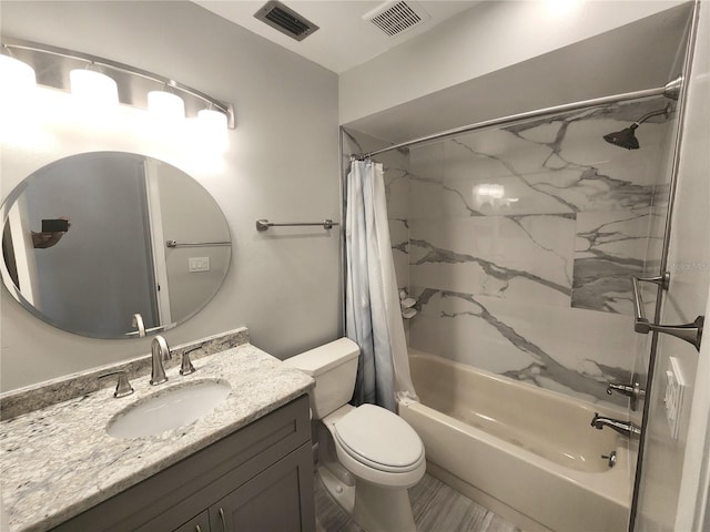 full bathroom featuring vanity, toilet, and shower / bath combo