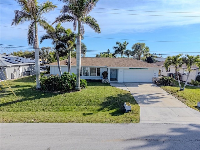 ranch-style house with a front lawn and a garage