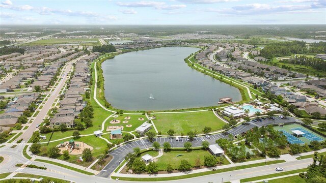 birds eye view of property featuring a water view