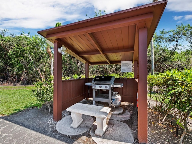 view of patio featuring a grill