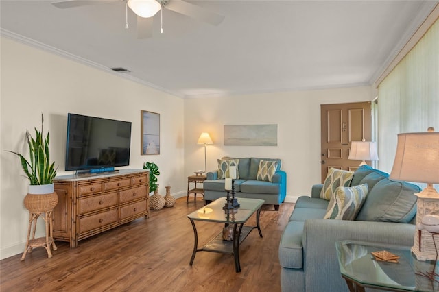 living room featuring ceiling fan, hardwood / wood-style floors, and crown molding