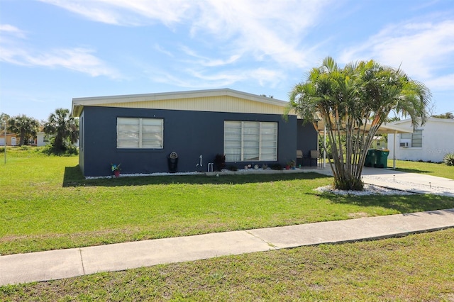 ranch-style home with a front yard