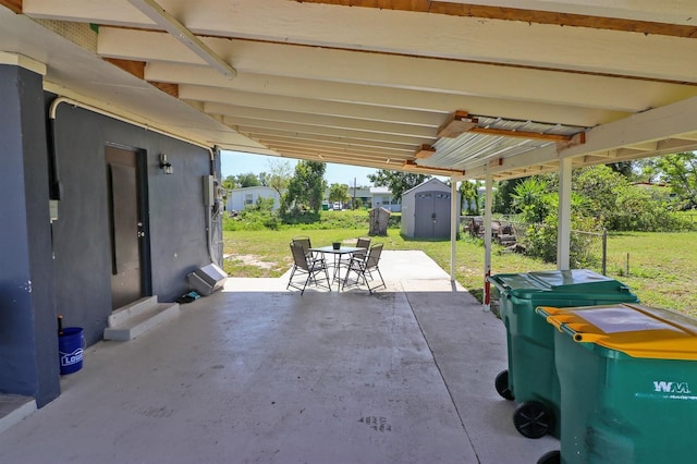 view of patio / terrace with a storage unit