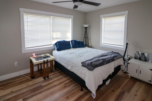 bedroom featuring ceiling fan and wood-type flooring