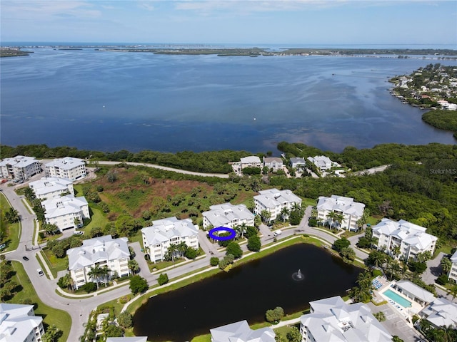 drone / aerial view featuring a water view