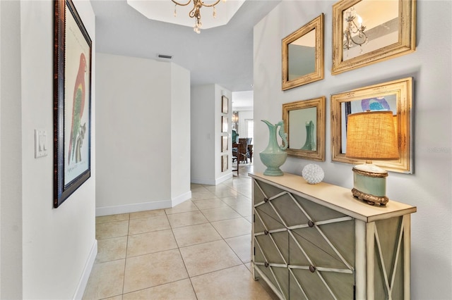 hallway with light tile floors