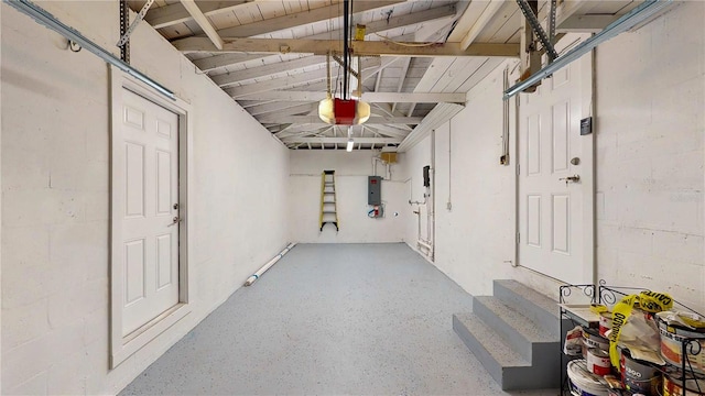 interior space with a garage door opener and wooden ceiling