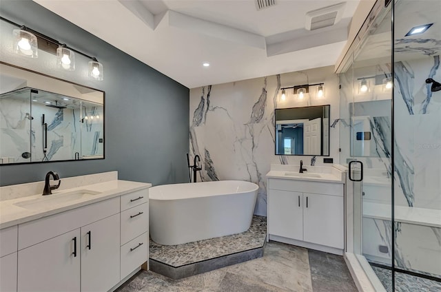 bathroom featuring shower with separate bathtub, large vanity, tile flooring, and dual sinks