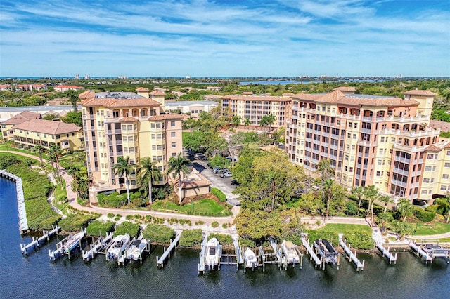 birds eye view of property featuring a water view