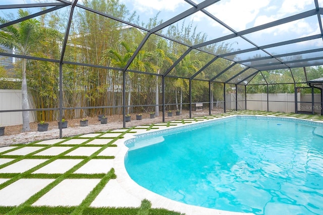 view of pool featuring a lanai