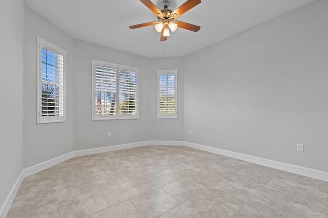 unfurnished room featuring ceiling fan