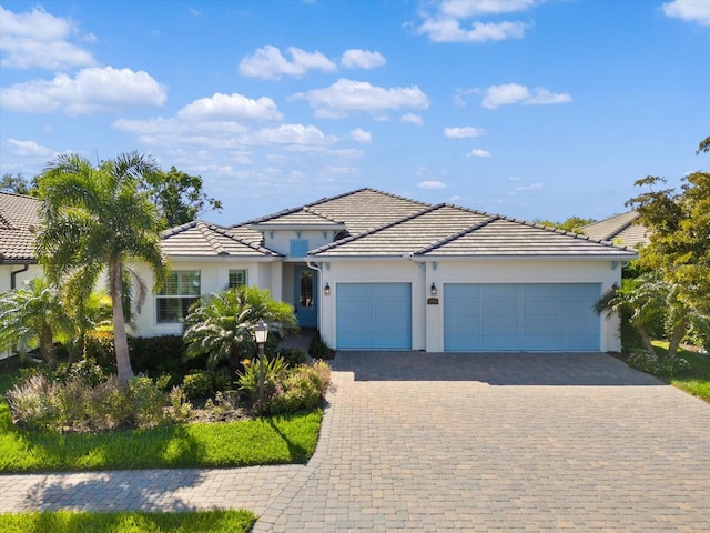 view of front of home with a garage