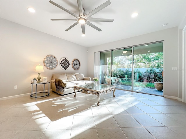 tiled living room featuring ceiling fan, baseboards, and recessed lighting