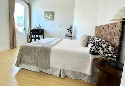 bedroom featuring wood-type flooring