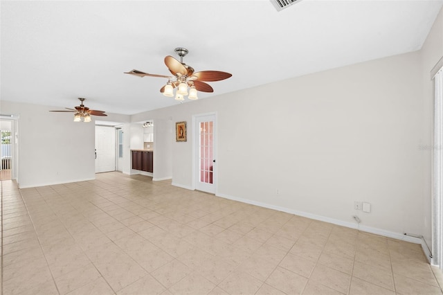 unfurnished room with ceiling fan