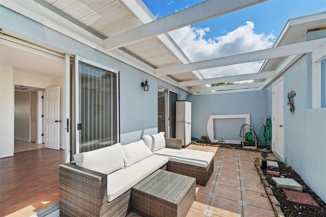 view of patio featuring a wooden deck and an outdoor hangout area