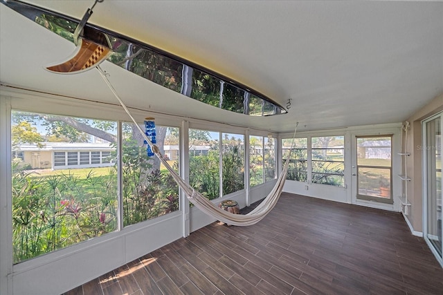 unfurnished sunroom featuring plenty of natural light