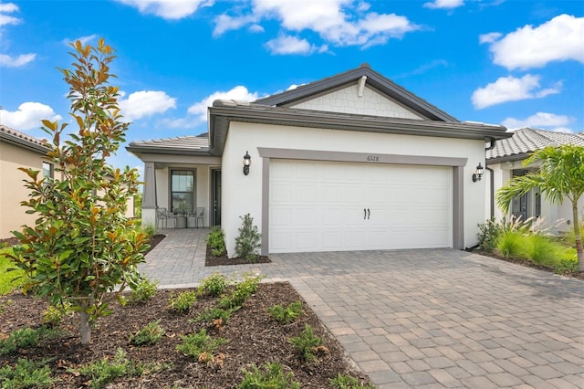 ranch-style home with a garage