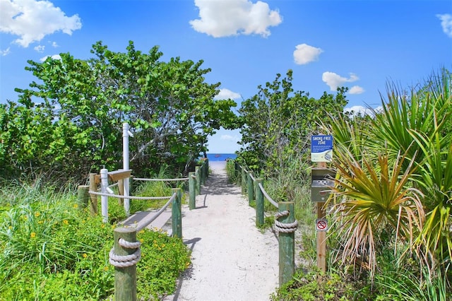 view of property's community featuring a water view