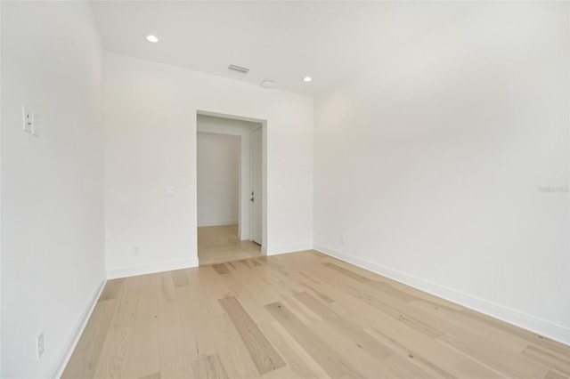 unfurnished room featuring light wood-type flooring