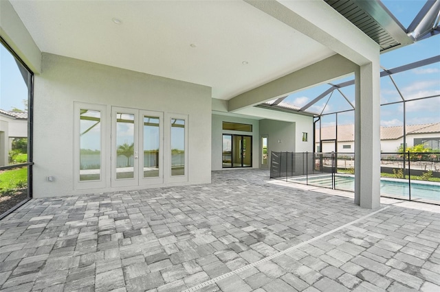 unfurnished sunroom with a pool