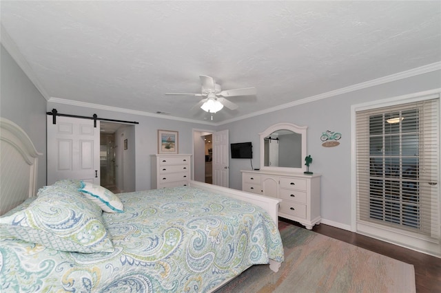 bedroom with a barn door, ceiling fan, dark hardwood / wood-style floors, and crown molding