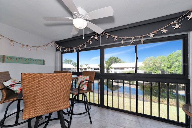 interior space featuring ceiling fan