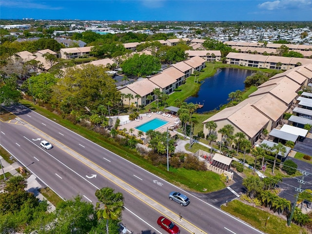 birds eye view of property featuring a water view