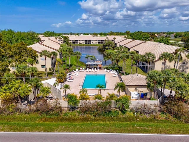 birds eye view of property featuring a water view