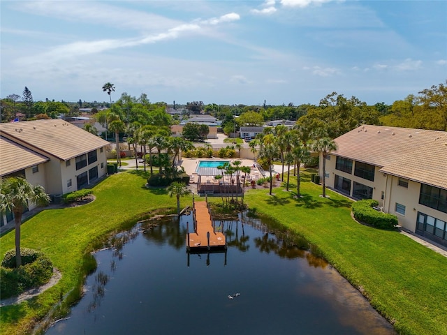 drone / aerial view featuring a water view