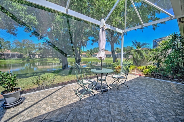 unfurnished sunroom with a water view