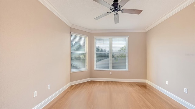 401 N Point Rd Unit 301, Osprey, FL 34229 - unfurnished room featuring ornamental molding, ceiling fan, and light wood-type flooring