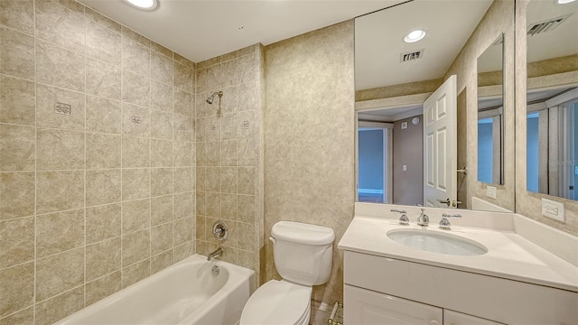 401 N Point Rd Unit 301, Osprey, FL 34229 - full bathroom with tiled shower / bath, toilet, and vanity