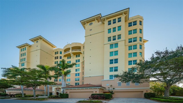 401 N Point Rd Unit 301, Osprey, FL 34229 - view of property featuring a garage
