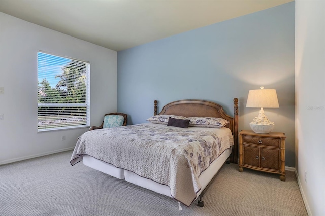 bedroom with light colored carpet