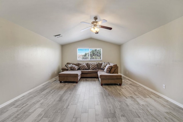 sitting room featuring vaulted ceiling, light hardwood / wood-style floors, and ceiling fan