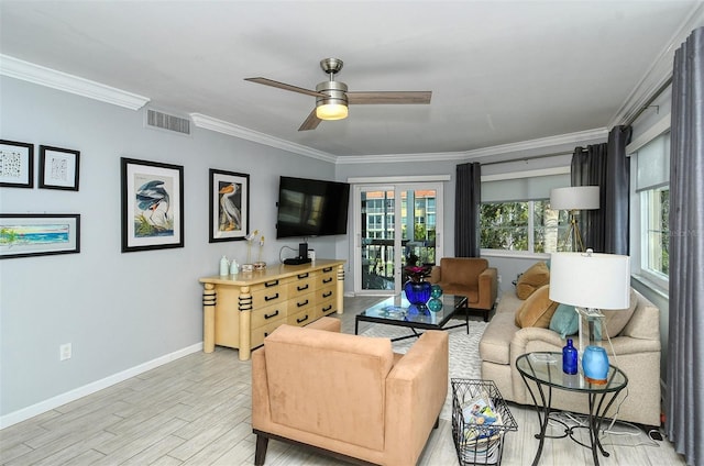 living room with crown molding, french doors, light hardwood / wood-style floors, and ceiling fan