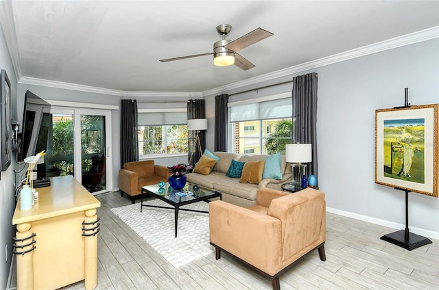 living room with crown molding, light hardwood / wood-style floors, and ceiling fan