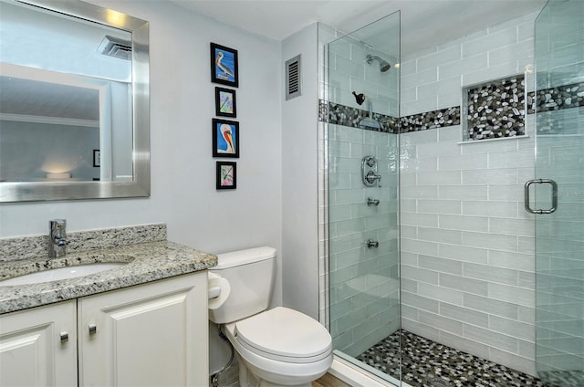 bathroom featuring an enclosed shower, toilet, vanity, and crown molding