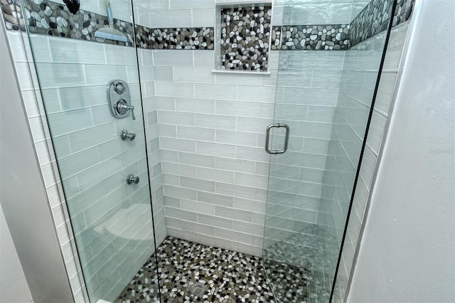 bathroom with an enclosed shower