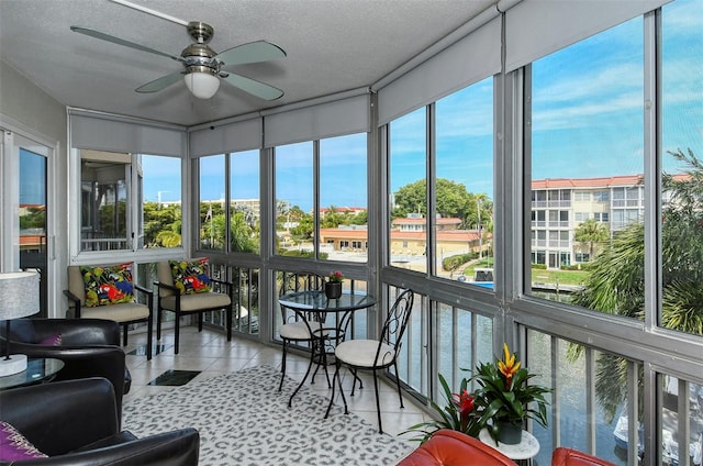 sunroom / solarium with ceiling fan