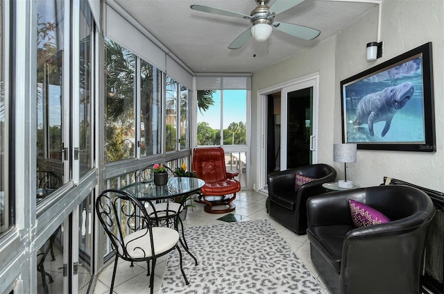 sunroom / solarium with ceiling fan