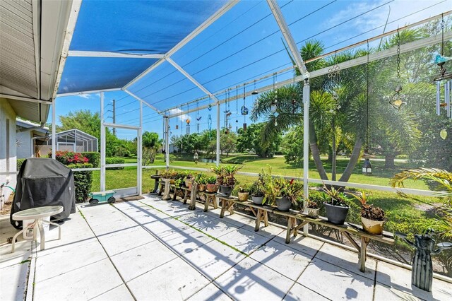 unfurnished sunroom with vaulted ceiling