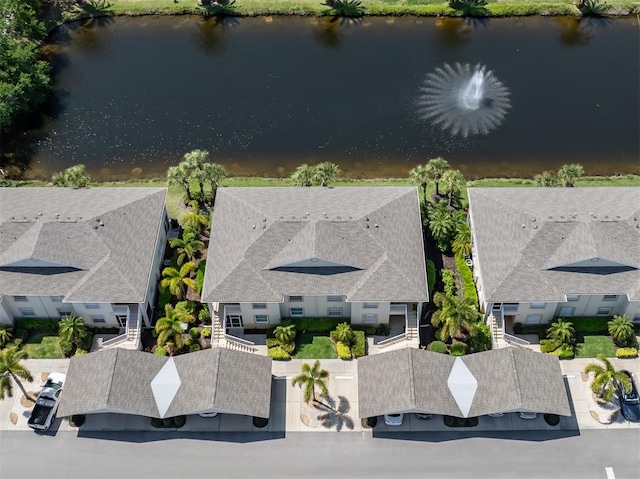 drone / aerial view featuring a water view