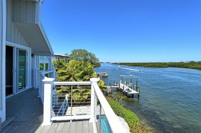 dock area with a water view